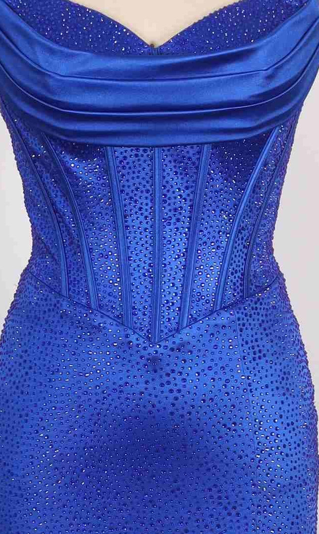 A close-up of the PromGirl Exclusive 250216: a royal blue, strapless satin prom dress with a sweetheart neckline, fitted bodice, and small rhinestone embellishments.